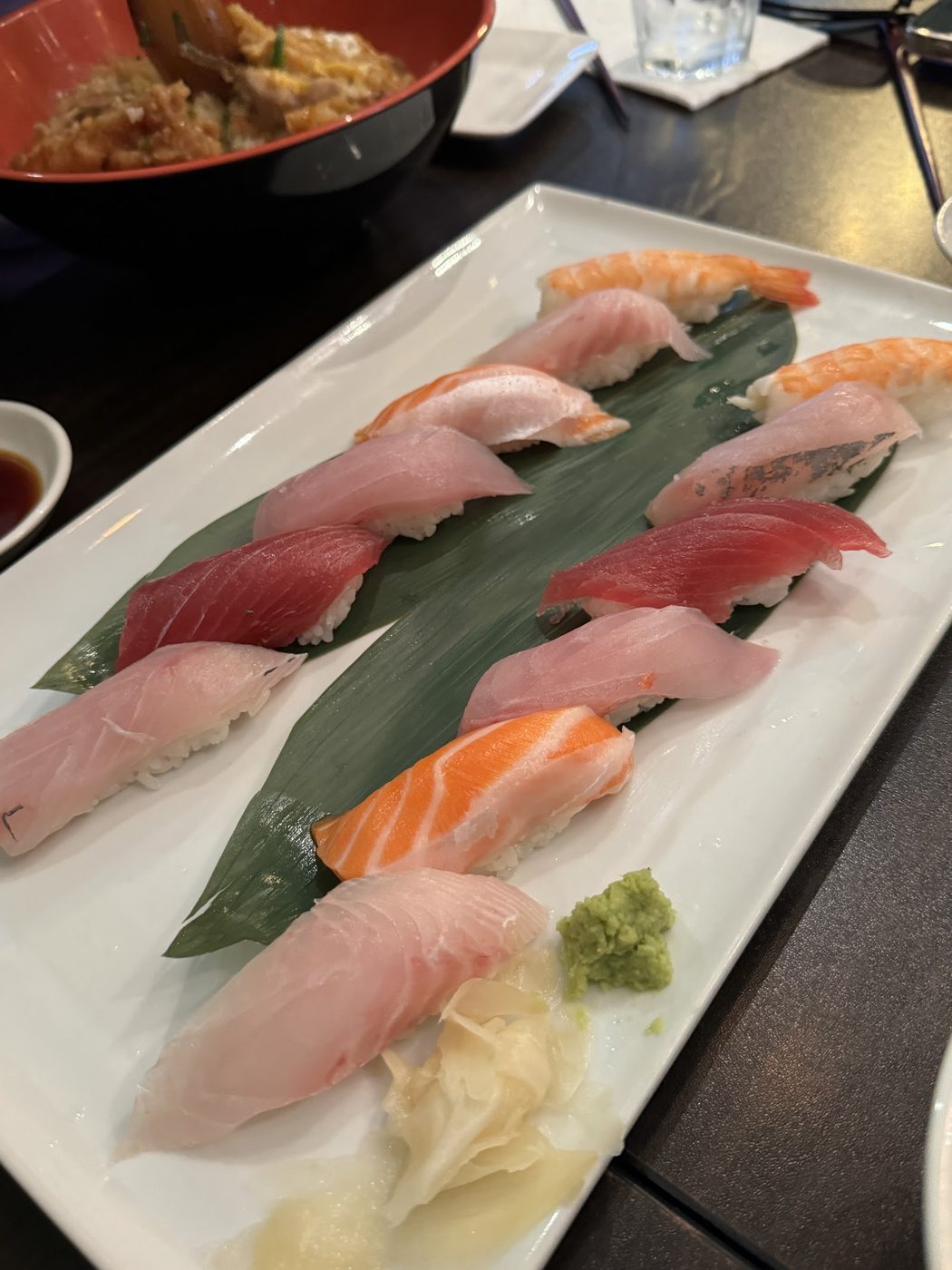 Fuga sushi and sashimi plate with salmon, tuna and prawn nigiri